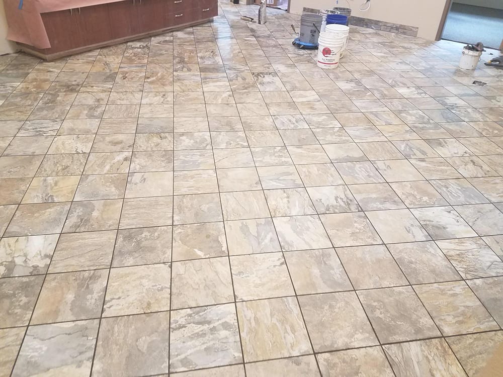 tile floor being maintained by carbonneau tile